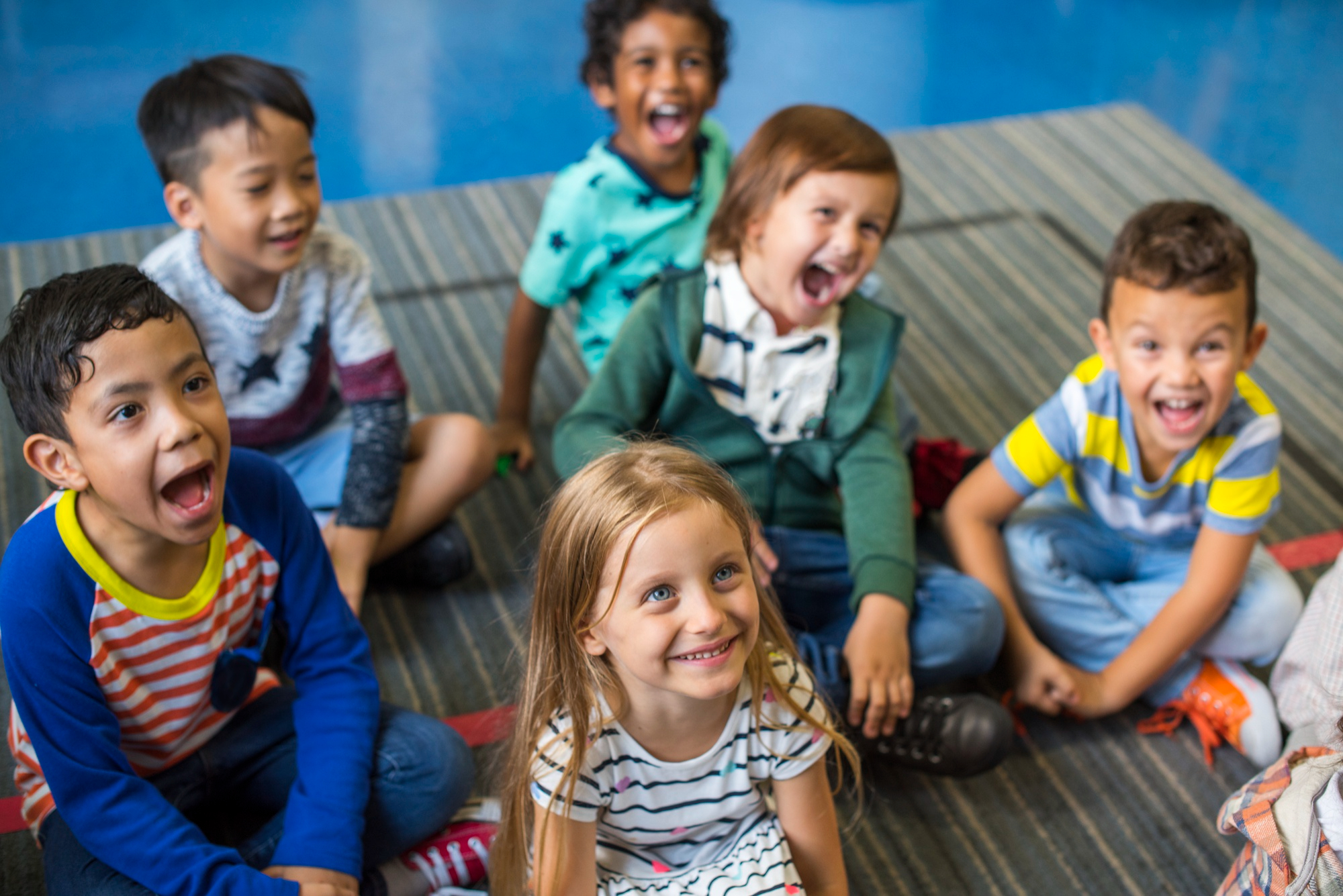 Group of happy children at ECD centre - Kinderflow management software